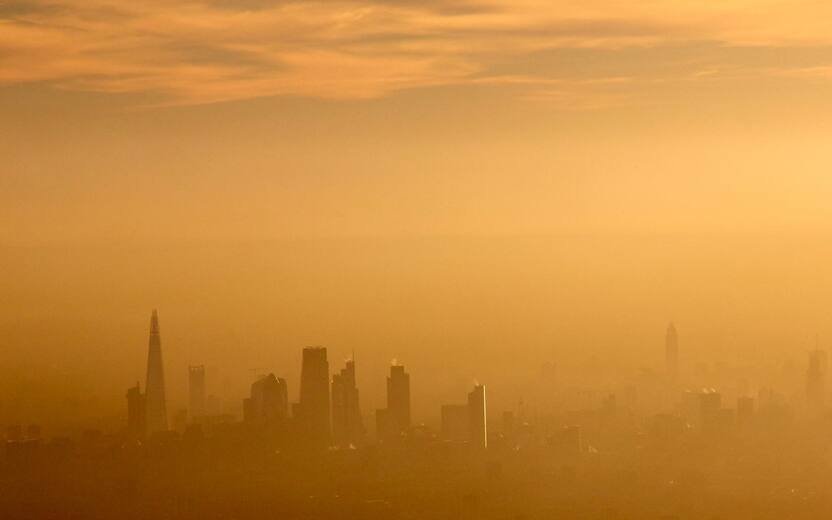 Aerial view South across city of London,air pollution, smog, Shard, towers, London, UK